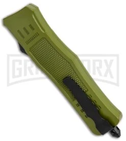 Atomic Defender Medium OTF Automatic Knife OD Green - Serr Two Tone Drop Point 9 Atomic Defender Medium OTF Automatic Knife OD Green - Serr Two Tone Drop Point -Featured Knife Shop Atomic Defender Medium OTF Auto OD Green Serr TT DP GX 37210 jr side large