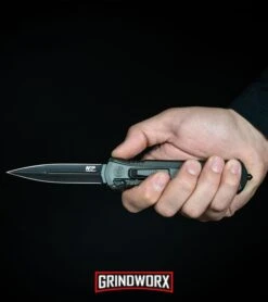 Smith & Wesson Spring Assisted Finger Actuator Tanto OTF Knife - Black Plain -Featured Knife Shop MP OTF Spring Assisted Spear Point Knife Gray Black BHQ 80731 kp in hand web large